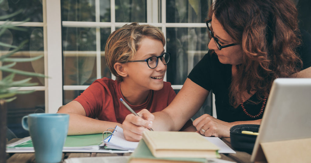 a mother and son working together