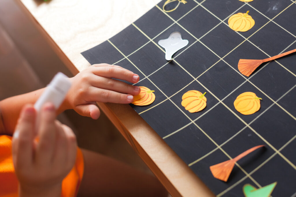 Child Playing Homemade Board Game - Game Based Learning - Make Your Own Board Game