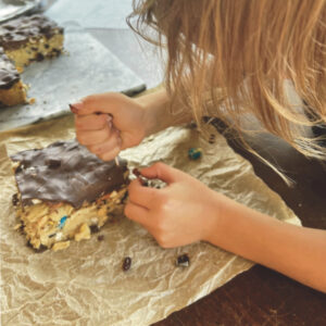 Edible Fossil Dig - Little Boy Digging Through Cookie to Find Fossils (Candy)