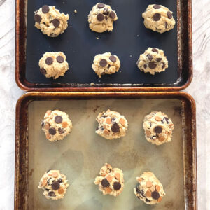Homeschool Science Activity: Chocolate Chip Cookie Chemistry Chocolate Chip Cookie Chemistry Activity - Two Pans of Balled Cookie Dough Ready to be Baked - One Chocolate Chip and One Peanut Butter Chip