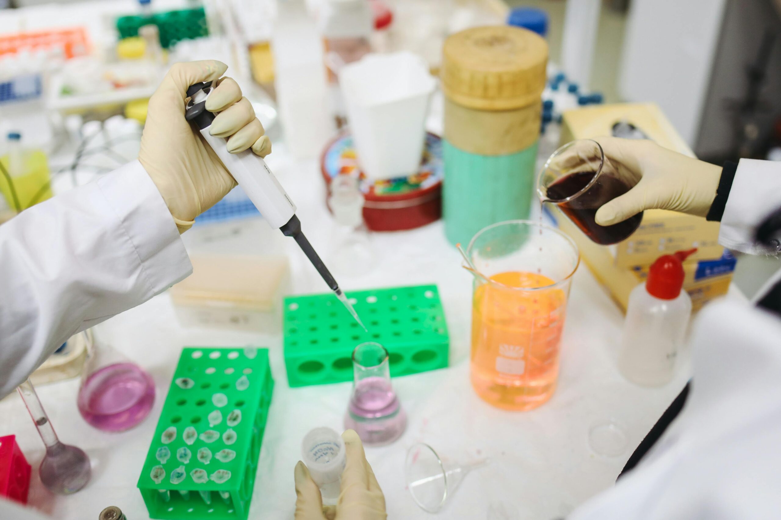 Homeschool Tips: How to Talk to Kids About Scary Science - Scientists Working in Lab with Various Liquids and Equipment